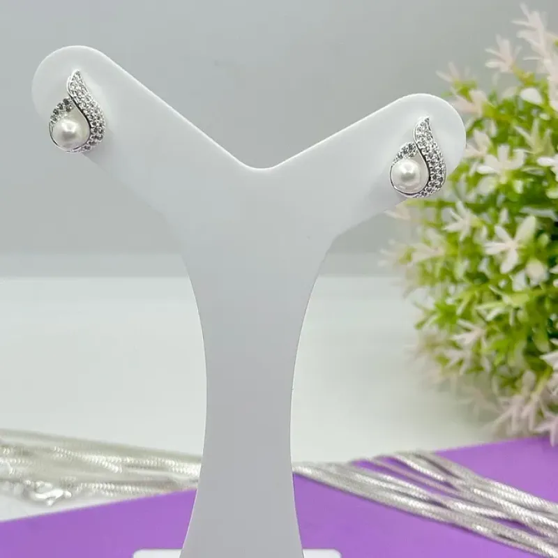 BRINCO PÉROLA ENVOLVIDA COM ZIRCÔNIAS BP1825