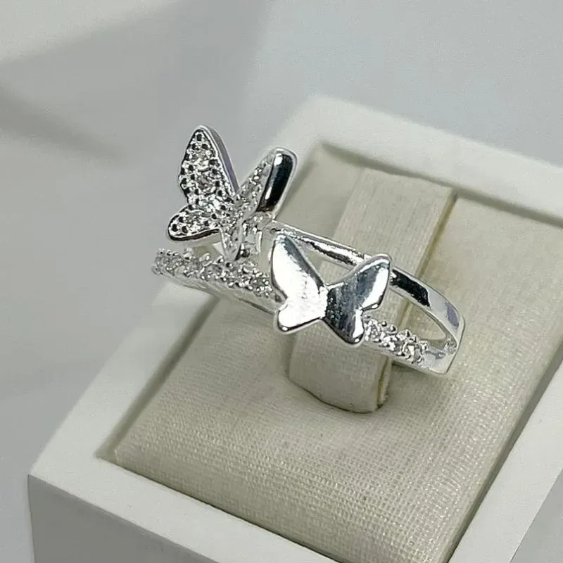 ANEL CRAVEJADO DUO BORBOLETAS AP2016