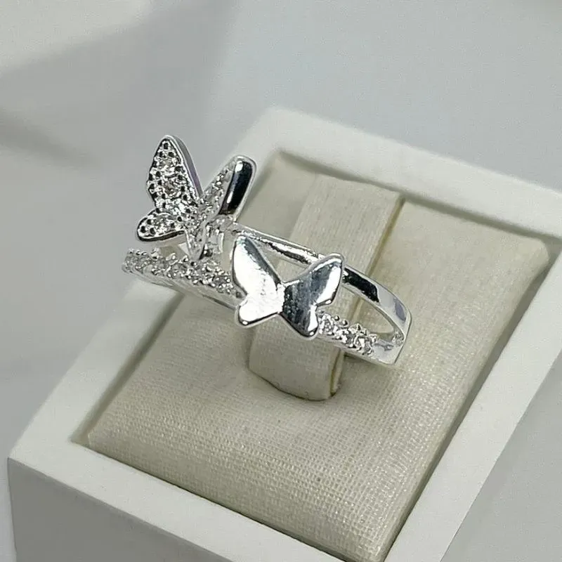 ANEL CRAVEJADO DUO BORBOLETAS AP2016