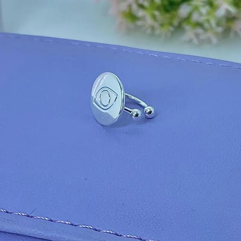 PIERCING FAKE OLHO GREGO PFP1204