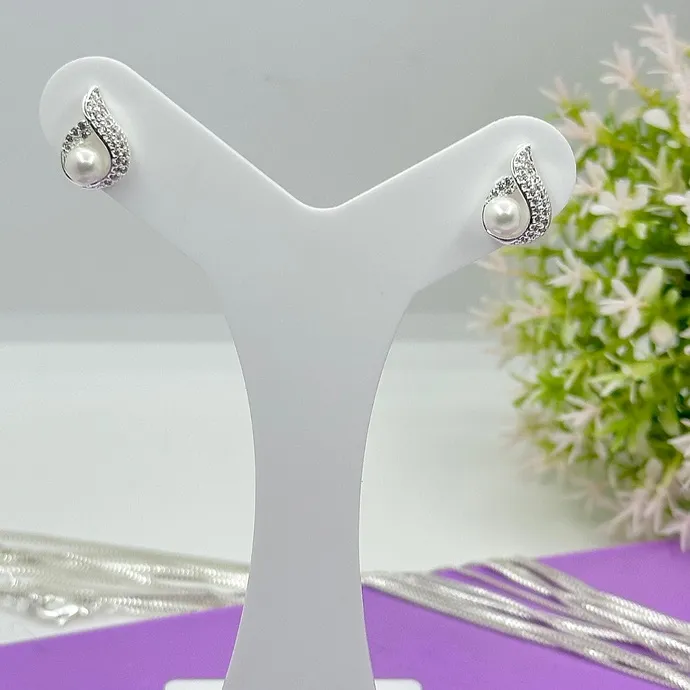 BRINCO PÉROLA ENVOLVIDA COM ZIRCÔNIAS BP1825