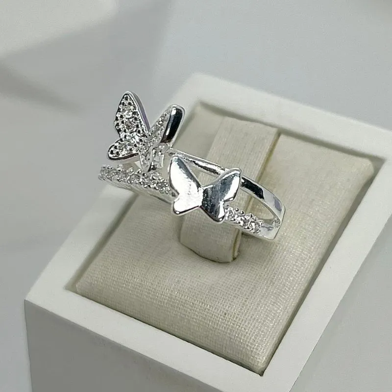 ANEL CRAVEJADO DUO BORBOLETAS AP2016