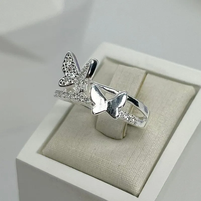 ANEL CRAVEJADO DUO BORBOLETAS AP2016