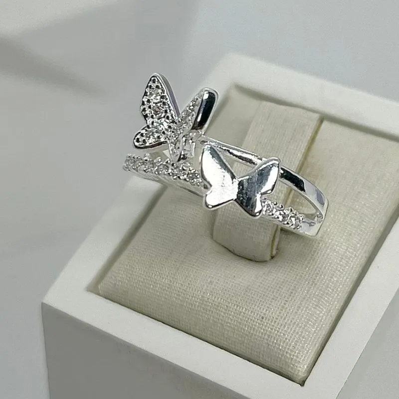 ANEL CRAVEJADO DUO BORBOLETAS AP2016